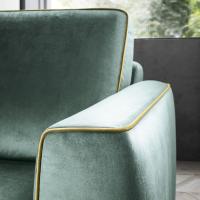 Oakland's curved upholstered armrests