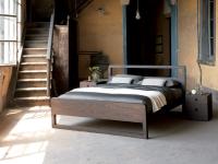 Feeling minimal style bed with wooden structure available in different wood veneers and matt lacquers