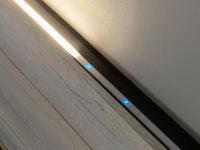 Close up of the integrated LED lights on the headboard with touch switch