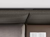 Detail of the difference in thicknesses between the flat and curved upholstered panels