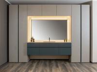 Brooklyn bespoke bathroom vanity with Corian countertop - Doors and base structure in Airforce Blue matt lacquer, matching the groove handles on the Pacific wardrobe
