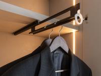 Close up of the extractable clothes rail in the Pacific bridge wardrobe