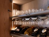 Interior bar cabinet with shelves, glass rack, bottle rack, LED lights.