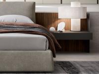 Delicate combination of upholstered bed surfaces and back panel slats