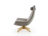 Side view of Agata armchair with high back and comfortable headrest