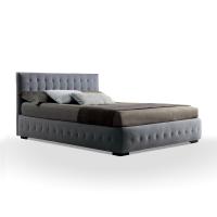 Bed with tufted, rounded bed frame with standard tufted headboard