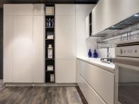 The wide columns are embedded with pantry, fridge and an open shelving column for your recipe books