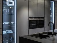 Columns house different appliances: fridge, oven, micro-wave, pantry, display case