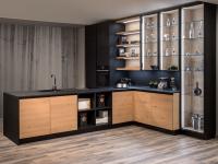 Modern kitchen in knotty brushed natural oak with top and columns in black Fenix
