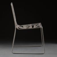 Domino chair in pierced metal plate