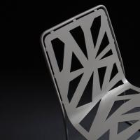 Domino chair in pierced metal plate - detail of the seat