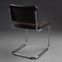 The Cesca B32 Chair by Marcel Breuer - seat upholstered in black fabric, edge in black lacquered beech wood and chromed steel structure
