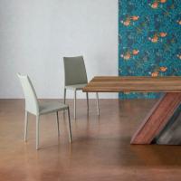 Composition with two Kayla chairs by Bonaldo and a wooden table
