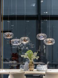 Coimbra glass shade pendant lamp by Cattelan above an important dining table