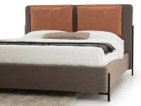 Nemi double bed with tubular metal legs on the side of the headboard and bed frame