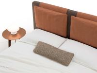 Close-up of the headboard with 2 upholstered cushions (only 1 cushion on the large single bed)