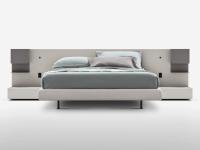 Freeport double bed with bespoke headboard with wall mounted metal shelves and spot-lights on the side