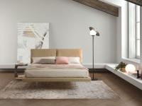 Quinn double bed with slim bed frame and transparent feet for a suspended effect