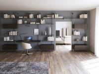 Modular bookcase with poles and storage Byron, configurated with cabinets, shelves and a desk made from wood.