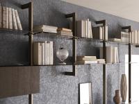 Focus on the suspended C-shaped support, allowing for the Byron bookcase to have very long shelves, or to create a suspended composition.