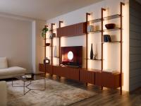 Byron bookcase set up as a wall unit with storage units and TV stand, with RAL lacquered uprights and wall units
