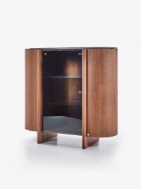 Dafne buffet cabinet made from curved wood, with a central glass door. Ideal for refined interiors