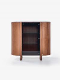 Dafne wooden buffet cabinet. The structure is made from curved wood, and incorporates a central glass door