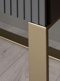 Close up of the sled base in champagne lacquered metal