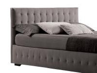 Tufted headboard and and rounded tufted bed frame