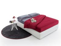 Sommier storage bed with tufting decoration with some accessories