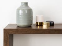 A detail of Alma console table