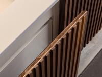 Detail of the fronts: the slats are applied to a veneered plywood panel