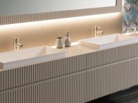 Three-quarter view of the washbasin bases with the double basin built-in top