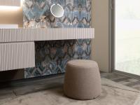 A simple pouf is all it takes to make the Heritage 02 suspended bathroom base a practical and elegant dressing table with drawer