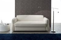 Camelia has a one-piece seat with folding arms entirely covered in fabric, faux leather or leather