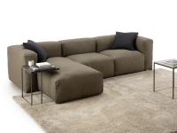 Softly peninsula sofa upholstered in natural Kaito fabric