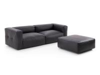 Softly linear black leather sofa with matching ottoman