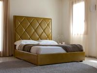 Upholstered bed Olivier with tall rhombus-quilted headboard