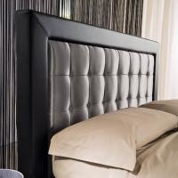 Detail of the upholstered tufted headboard with pinched manufacturing technique