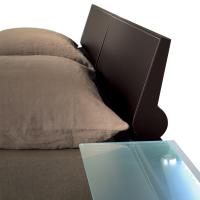 detail of the comma shaped headboard cushion - the positioning of the glass shelf will not be as in this picture