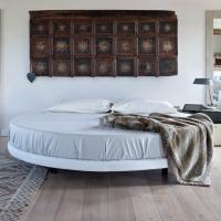 Record round bed can be covered in fabric, leather or faux leather