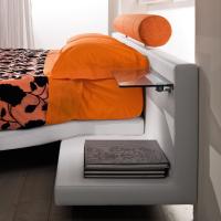 Ring mattress is shaped with a rectangular and a round one to fit the bed frame