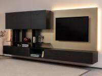 A Royal wall system with base units in aged oak wood (E27 Carbon)