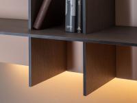 Close up of a wooden shelf and dividers with edges in black plywood