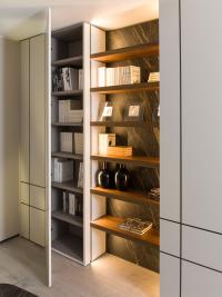 Bookshelf-unit between two coloums units