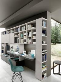 View of the open bookcase terminal in material laminate coordinated with the structure and hinged doors