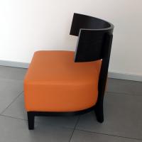 Lanky armchair with wengé structure and leather seat