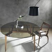 Tilda curved design wooden chair enjoyable under a glass top table