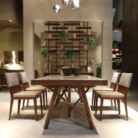 Zeta dining room table in wood with sloping legs that brighten up the structure