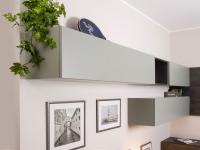 Plan wall unit with flap door, available in melamine, wood veneer or matt (as in photo) and glossy lacquer